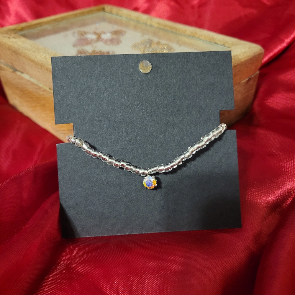 Silver Beaded Bracelet with Blue Charm